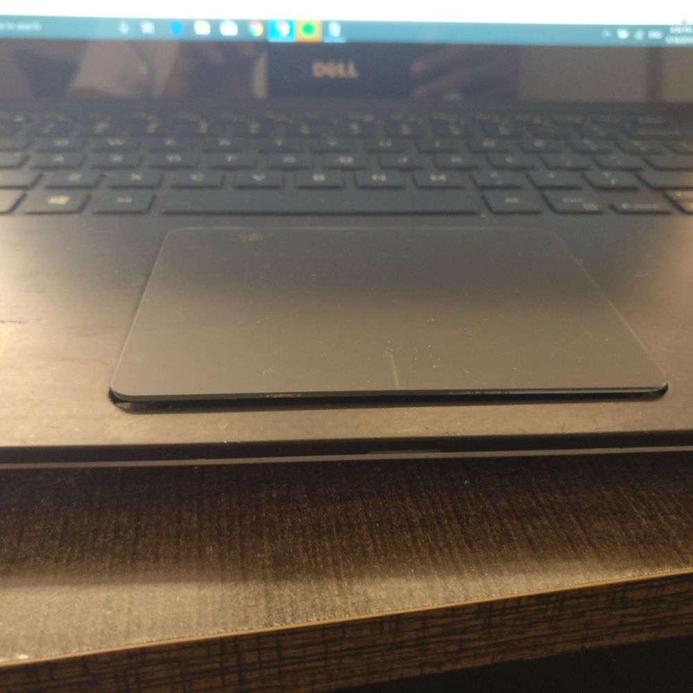 xps 15 9560 touchpad popping out