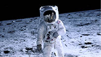An astronaut walking on the moon facing the camera 