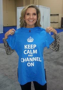 Dell Channel Chief Cheryl Cook holding shirt that says Keep Calm Channel On