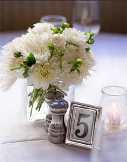 white flowers in vase on table