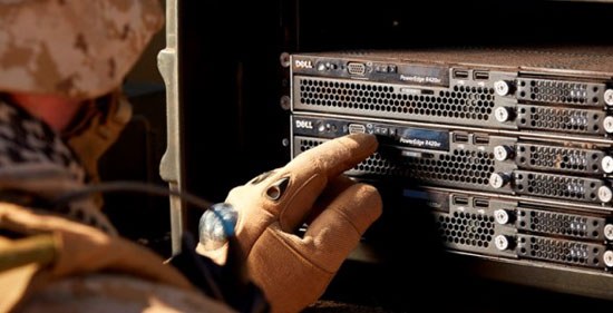 Military personnel looking at Dell Poweredge servers