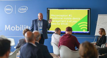Dell executive speaking to a crowd on the topic of mobility and byod