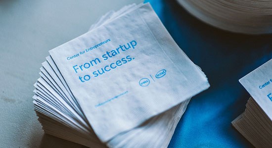 Photo of napkin with text "From startup to success" on it