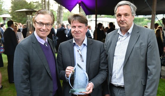 Erik Preisser, Marketing Manager, Dell Netherlands, collecting the Gold Rising Star award with Tim Curran, CEO GTDC on his left and Peter van den Berg, General Manager, EMEA, GTDC on his right.