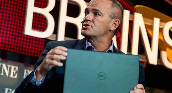 Dell vice chairman of operations and president of client solutions Jeff Clarke holds a laptop made of recycled carbon fiber at the Fortune Brainstorm E 2015 conference.