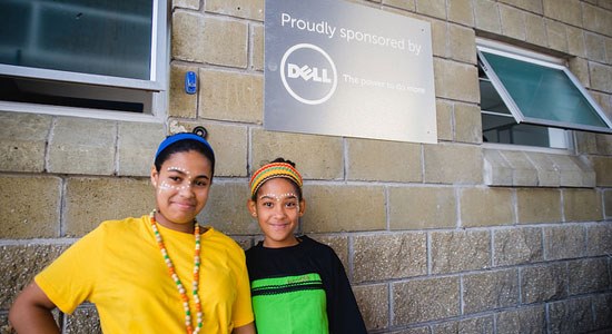  Two girls at  Christel House South Africa, a school sponsored by Dell that provides free education to girls from low-income families