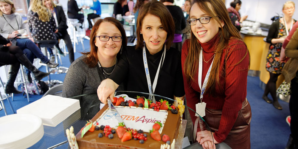 Cutting cake at Dell Ireland STEM mentoring program launch