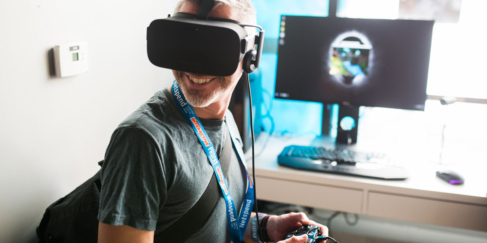 man using virtual reality headset at dell experience at sxsw 2016