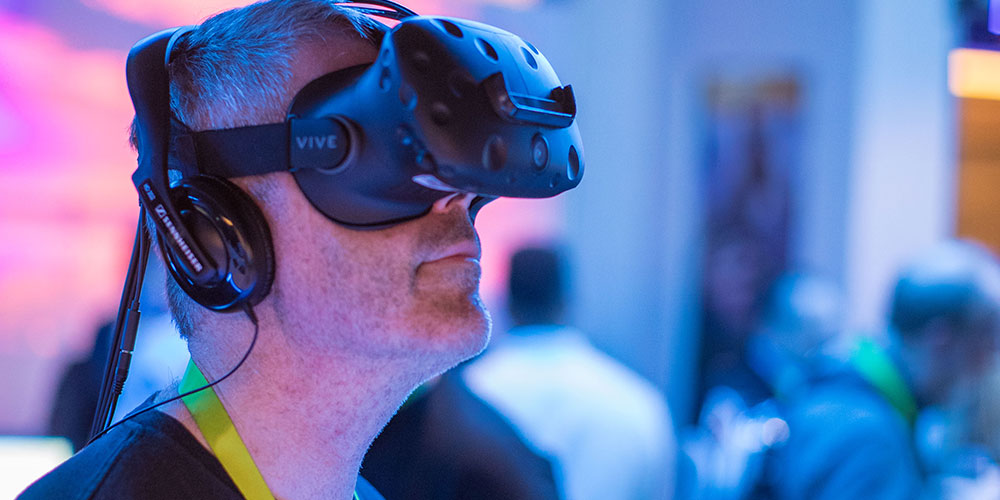 Man wearing HTC Vive headset at Dell Experience at CES 2018