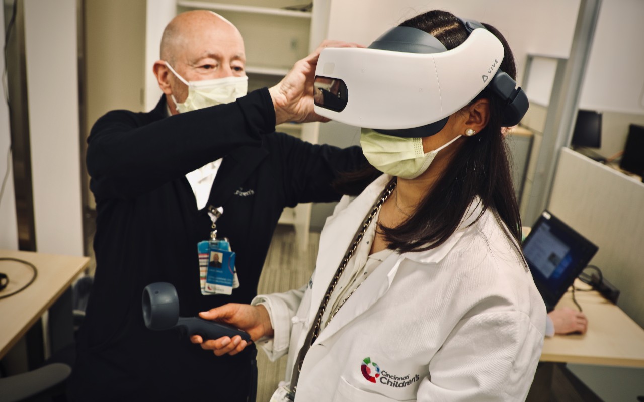Doctors with Cincinnati Childrens' Hospital working with Virtual Reality equipment.