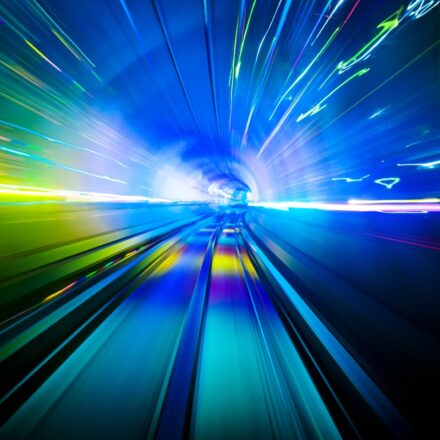 Travelling in a lighted tunnel at speed.
