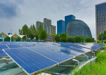 Solar panels in operation in an urban setting.