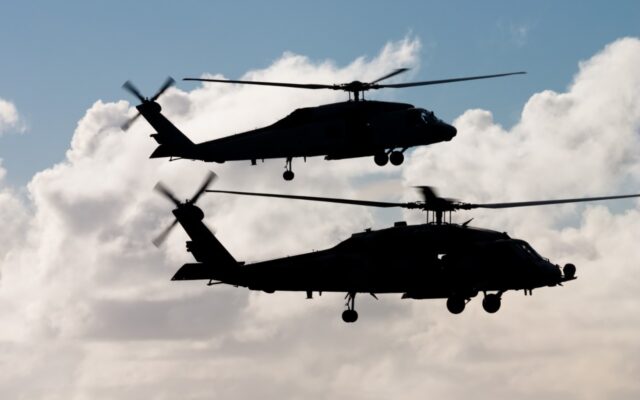 U.S. Military Blackhawk helicopters in flight.