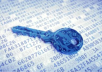 Digital image of a key with circuitry against a background of encrypted coding in blue and white, signifying security and privacy.