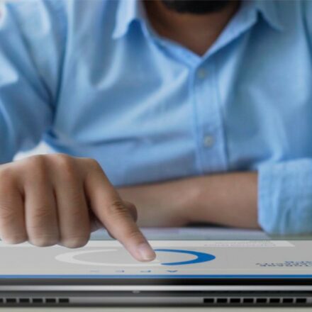 IT professional monitors Dell Technologies APEX platform status on a Latitude 9520 laptop.