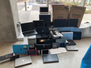 Computer and electronics equipment of various brands being turned in to the Dell Trade In program for e-waste recycling. 