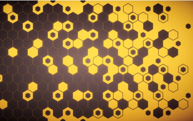 Hexagonal grid in shades of darker brown and medium yellow colors, Some hexagons have brown centers surrounded by yellow.