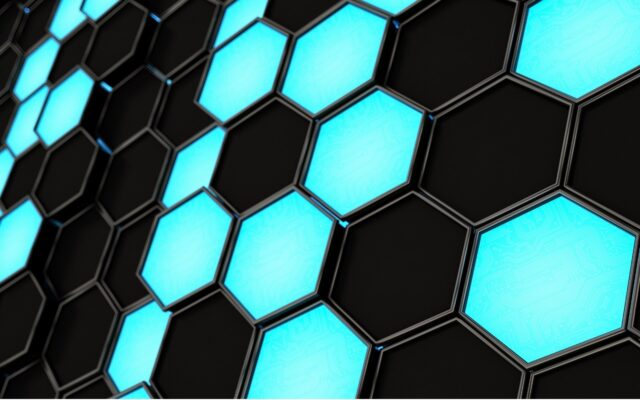 Digitally generated image of neon blue and black hexagonal pattern.