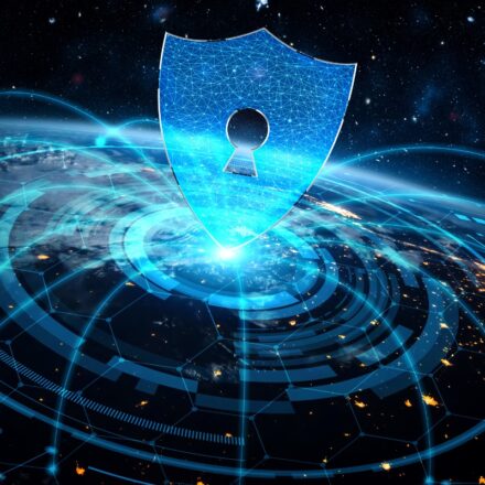 Digital image of a security lock symbol and protective shield over the globe.