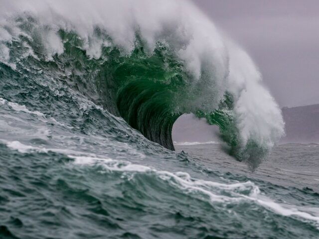 Photo of a wave crashing courtesy of Todd Turner from Unsplash