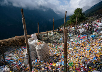 Trash accumulated near Syangboche Namche Bazaar, Nepal along the route to Mount Everest Base Camp. Photo courtesy of Martin Edstrom.