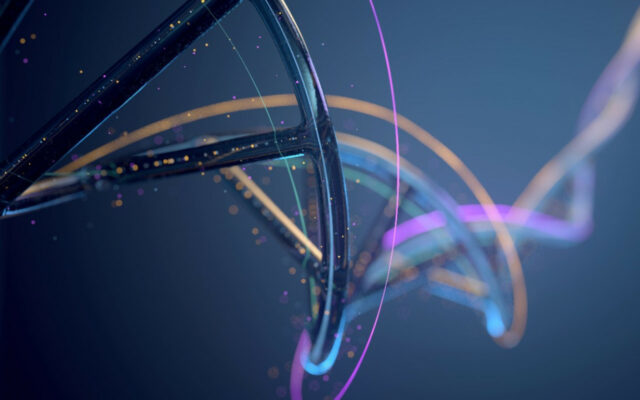 Digitally created image of DNA strands against a blue/silver background. Copper and pink colored strands appear as well as small pink and colored lights in the background.
