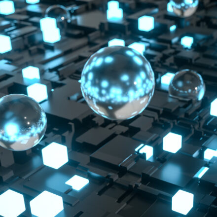 Digital image of spheres with blue lights on a high tech motherboard platform.