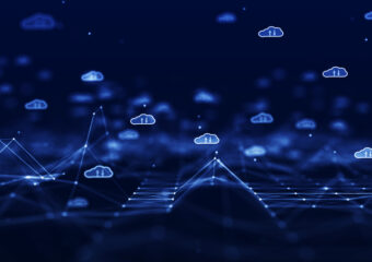 Cloud computing technology concept for transfer data to storage system. White cloud icon over polygon on dark blue background.